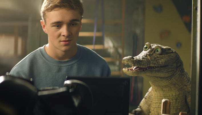 Junge mit Krokodil