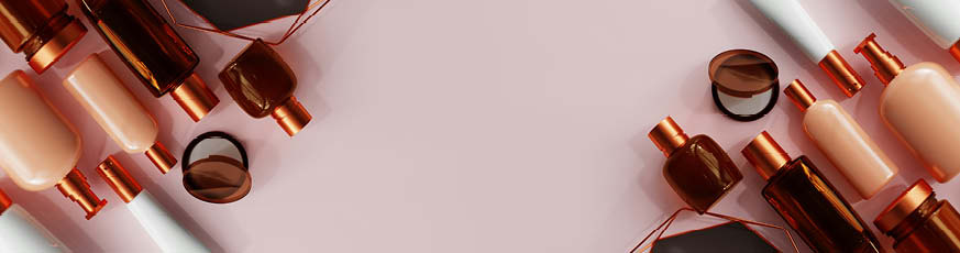 lifestyle-kosmetikprodukte-braune-weisse-aprikotfarbene-flaeschchen-spender-rosa-hintergrund-873x230-91985-0