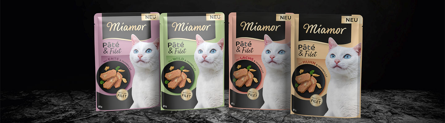 Miamor Pate & Filet Nassfutter in 4 Sorten vor schwarzem Hintergrund